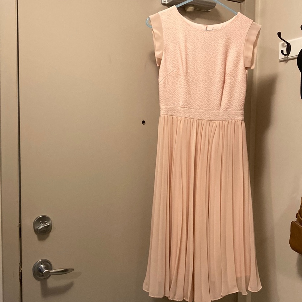 Pink chiffon dress.